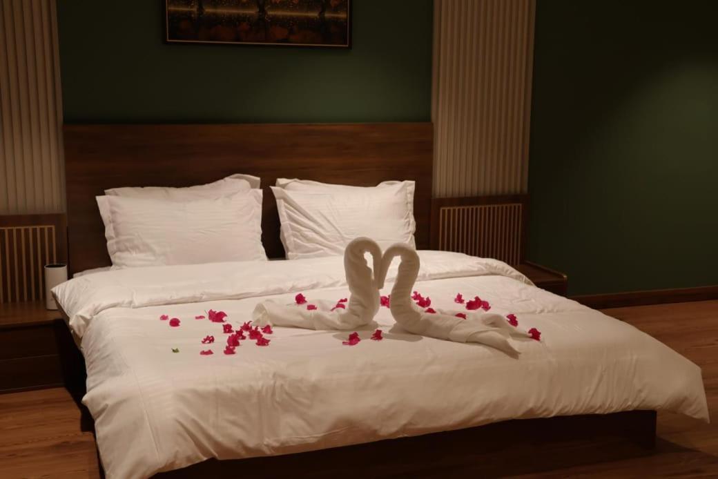 Al Bayan Palms Hotel Nizva Kültér fotó